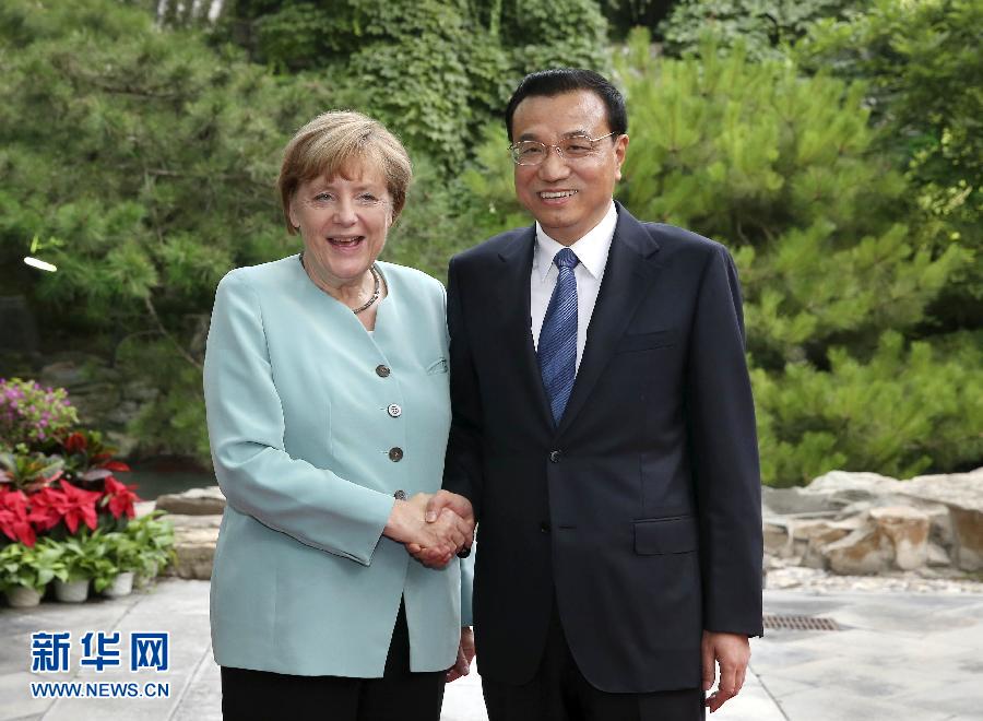 7月6日，国务院总理李克强在北京钓鱼台养源斋会见来华进行正式访问的德国总理默克尔。 新华社记者 庞兴雷 摄 