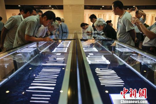 近300枚古代简牍亮相北京展示千年书法文化