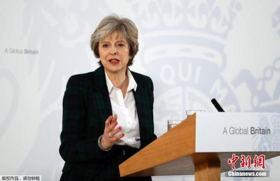 资料图：英国首相特里莎·梅就英国脱欧方案发表演讲。