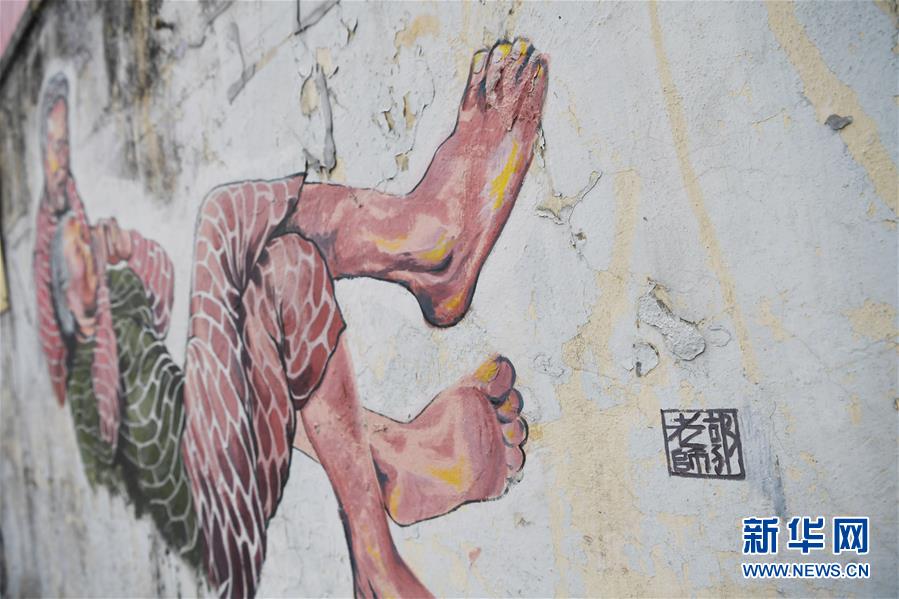香港锦田壁画村：200名义工绘就爱的画卷图2
