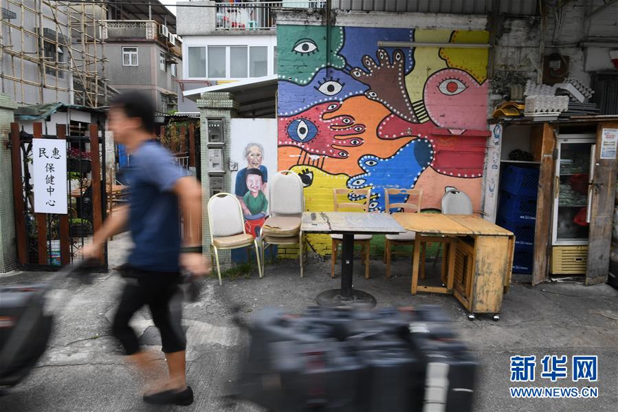 （港澳台·香港故事·图文互动）（5）香港锦田壁画村：200名义工绘就爱的画卷