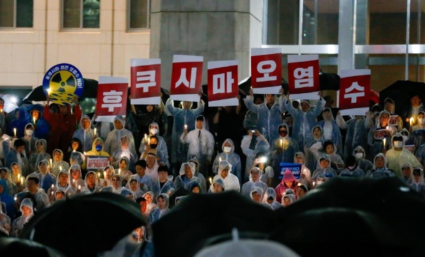 韩国民众集会抗议日本政府决定启动核污染水排海（高清组图）