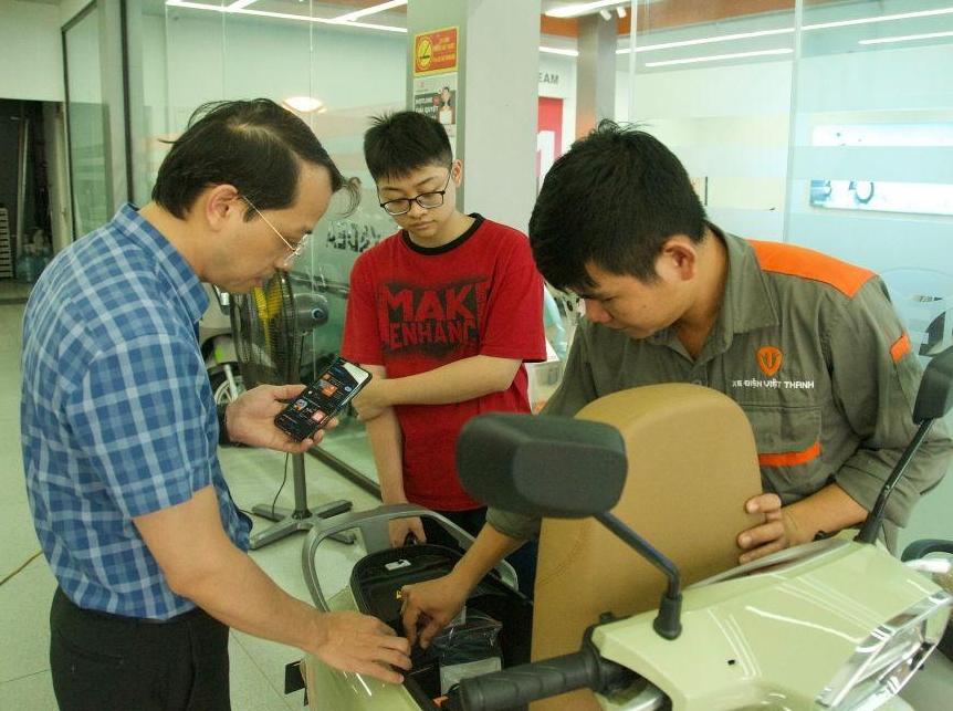 记者手记丨河内街头驶来“中国绿”
